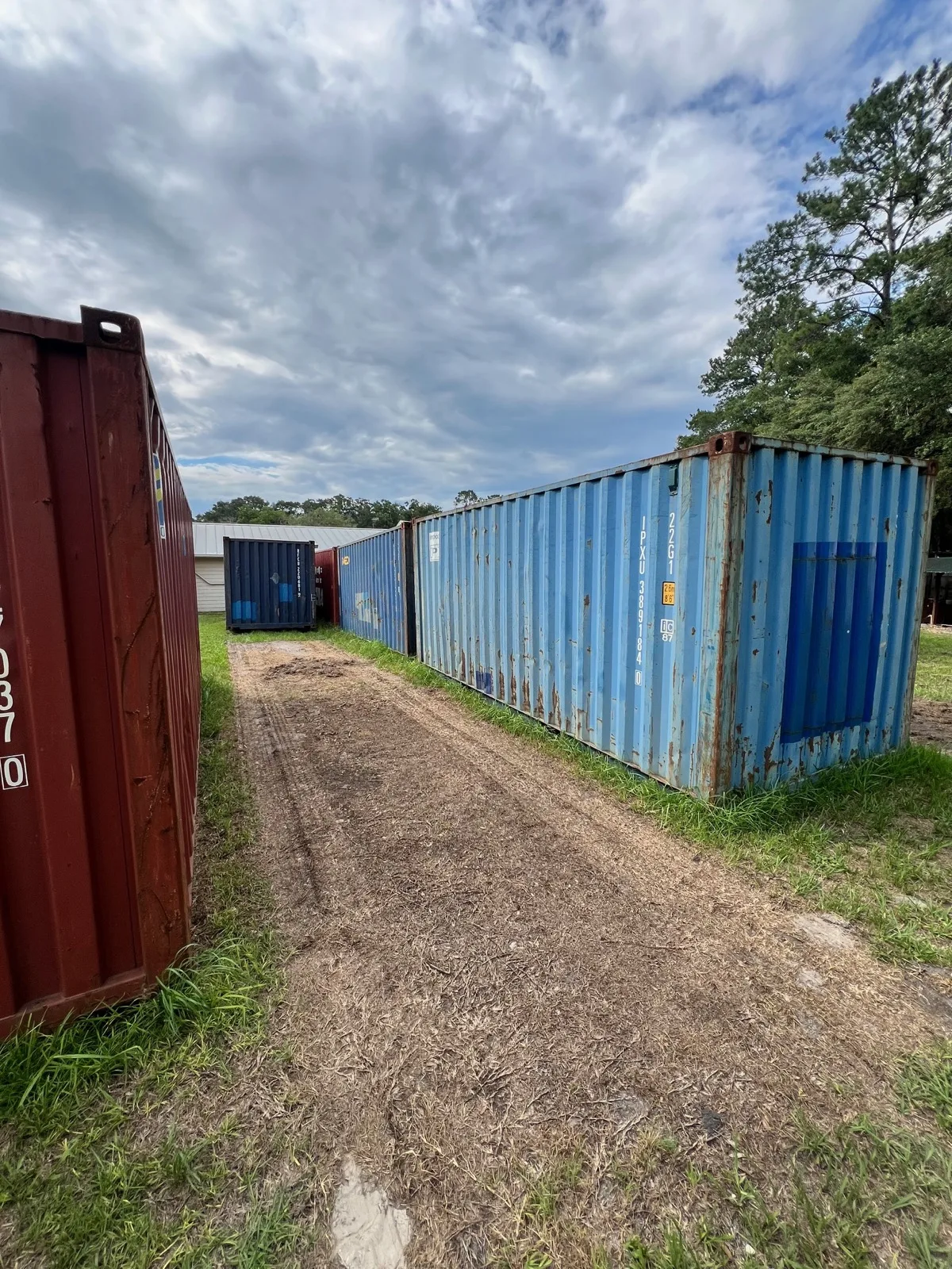 Used 20-foot shipping containers at the Williston yard